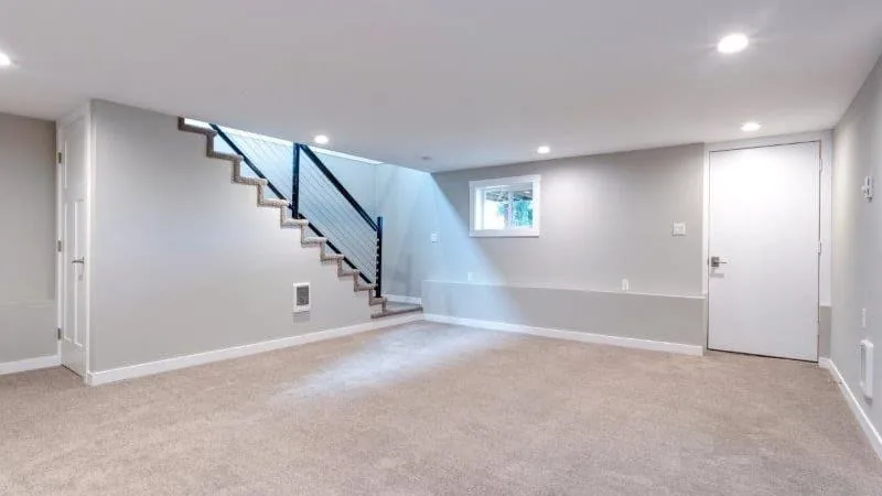 Code-compliant egress window installation in Iowa basement — BAM Basements & Masons