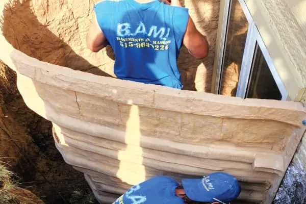 Code-compliant egress window installation in Iowa basement — BAM Basements & Masons