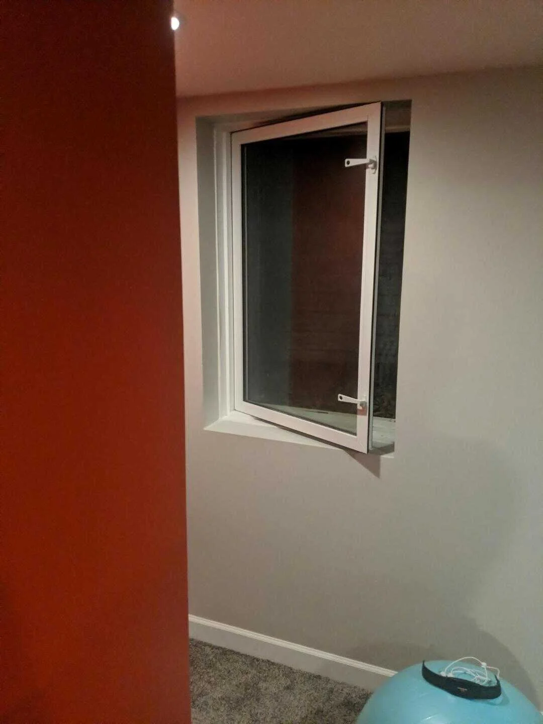Code-compliant egress window installation in Iowa basement — BAM Basements & Masons