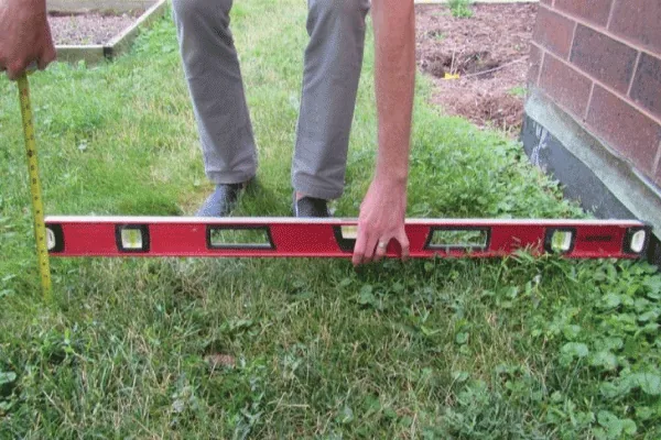 Grading property for drainage