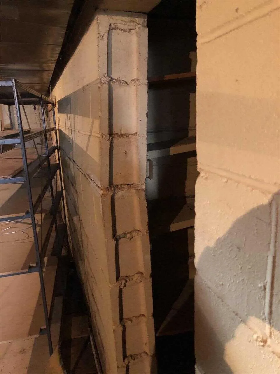Sinking foundation in Iowa home — BAM Basements & Masons foundation repair solution