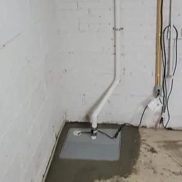 Sump pump installation in Iowa basement — BAM Basements & Masons Des Moines